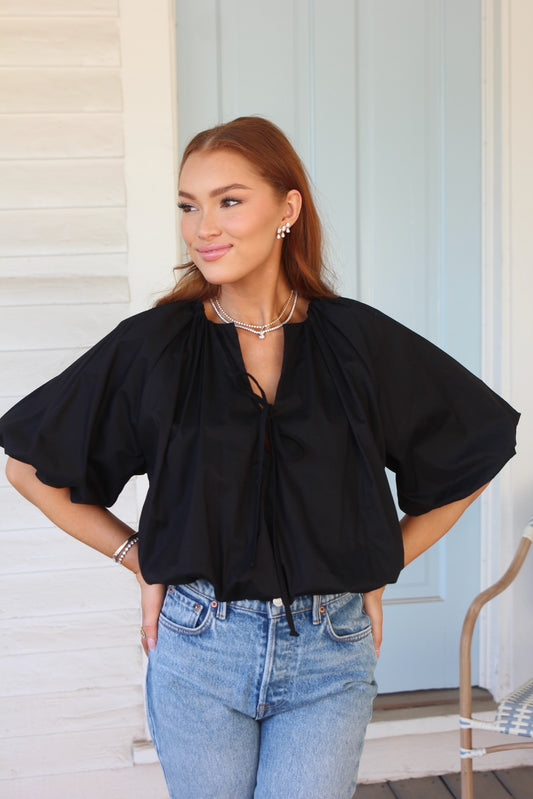 Karlie Solid Poplin Bubble Tie Front Top in Black